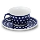 Coffee cup with curved out edge and saucer in the decor 42