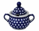 Conical sugar box with hole for a sugar-spoon in the...