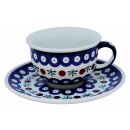 Coffee cup with curved out edge and saucer in the decor 41