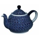 Absolutely retro teapot in the shape and pattern with a...