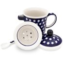 Tee mug with cover tea strainer and spoon in the decor 42