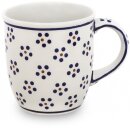 Bulgy mug with round handles in the decor 1