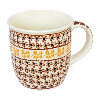 Bulgy mug with round handles in the decor 973