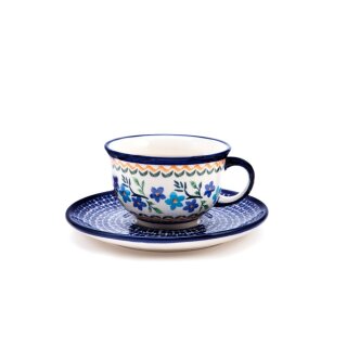 Coffee cup with curved out edge and saucer in the decor 1154a