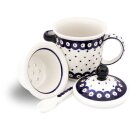 Tee mug with cover tea strainer and spoon in the decor 28